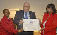 New York Metro Area APWU retiree Eleanor G. Bailey and local President Clarice Torrance with Doug Holbrook. 