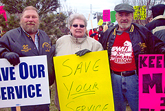 Retirees Department members Mark Hart, Patty Miller and Al LaBrecque, protest the USPS decision to close the Flint (MI) mail processing center on March 16, 2011. 