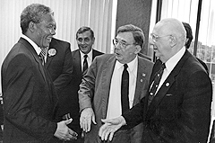 Mandela greets APWU President Moe Biller (right) and AFL-CIO President Lane Kirkland during a 1991 visit to Washington DC. 