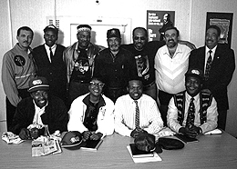 APWU observers of the South African elections met with leaders of the Post and Telecommunication Workers Association and toured a postal facility in Johannesburg. Seated is Judy Beard, flanked by POTWA officers. Standing left to right are Myke Reid, POTWA President Lefty Monyokolo, Sidney Brooks, John R. Smith, Malcolm Smith, Randy Sutton and Teddie Days.