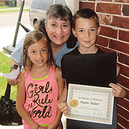 When the tornado hit, Ryan and his sister, Zylee, were buried in debris at their school. Zylee was rescued by a policeman. Ryan dug himself out and immediately began digging out others. He later declared to his grandmother that he helped save lives, so the APWU sent him a certificate for bravery and a $50 check.