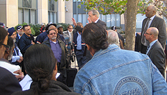 Motor Vehicle Service drivers listen to an update outside the federal courthouse Nov. 9. 2012