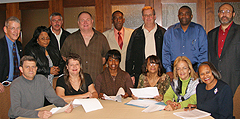 Seated, left to right, are APWU Rank and File Bargaining Advisory Committee members Larry Miller, 480-481 (MI) Area Local; Marcie Ryan, Deaf/Hard of Hearing Task Force; Gwen Ivey, Philadelphia Area Local; Committee Chair Clarice Torrence, New York Metro Area Local; Carolyn Pierce, Broward County (FL) Area Local; Koquise Nolan, Oklahoma City Area Local. Standing are Robert Johnson, Greater CT Area Local; Debra McDaniel, Mail Equipment Shop Local (DC); Chuck Pugar, Pittsburgh Metro Area Local; Mike McDonald, Massachusetts APWU; Danny Pride, Cleveland Area Local; Bob Dempsey, Boston Metro Area Local; MacLawrence Ford, Indianapolis Area Local; and John Driver, Greater Los Angeles Area Local.