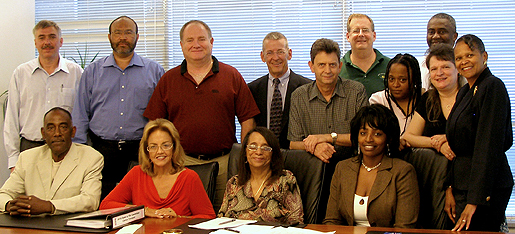 Seated, left to right, are Danny Pride, Cleveland Area Local; Carolyn Pierce, Broward County (FL) Area Local; Committee Chair Clarice Torrence, New York Metro Area Local; and Gwen Ivey, Philadelphia Area Local. Standing are Chuck Pugar, Pittsburgh Metro Area Local; John Driver, Greater Los Angeles Area Local; Mike McDonald, Massachusetts APWU; Robert Johnson, Greater CT Area Local; Larry Miller, 480-481 (MI) Area Local; Bob Dempsey, Boston Metro Area Local; Debra McDaniel, Mail Equipment Shop Local (DC); MacLawrence Ford, Indianapolis Area Local; Marcie Ryan, Deaf/Hard of Hearing Task Force; and Koquise Nolan, Oklahoma City Area Local.