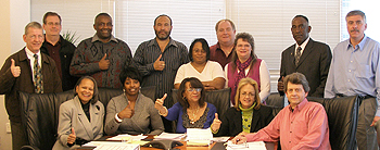 Members of the APWU Rank-and-File Bargaining Committee approve the Tentative Contract unanimously on March 16.