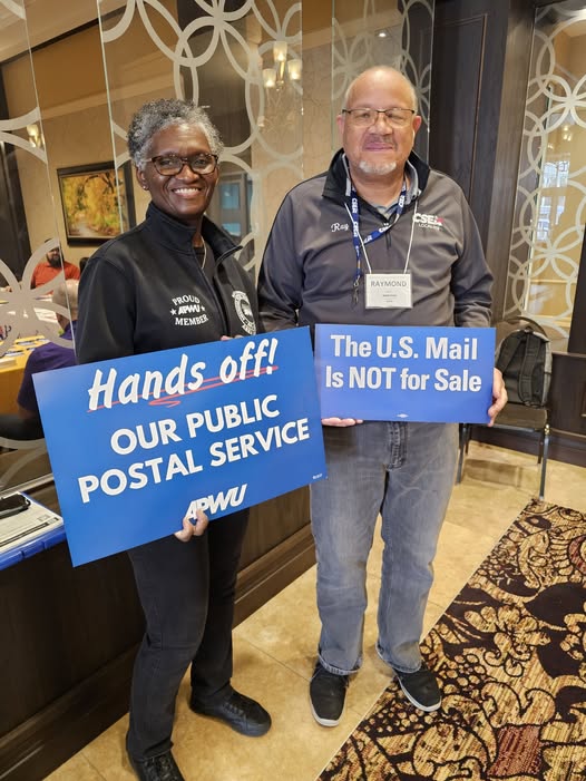 Jaylna West and husband supporting Hands Off Our Public Postal Service