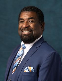 Headshot of APWU Clerk Division Director Lamont Brooks