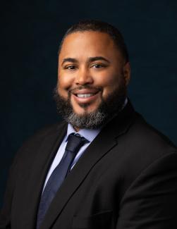 Headshot of APWU Support Services Director Arrion Brown 2022-2025