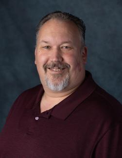 Headshot of APWU National Business Agent Mike Hetticher