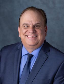 Headshot of APWU National Business Agent Robert Romanowski