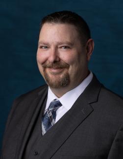 Headshot of APWU Maintenance Division Assistant Director Jason Treier