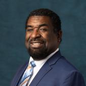 Headshot of APWU Clerk Division Director Lamont Brooks