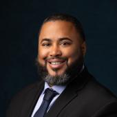 Headshot of APWU Support Services Director Arrion Brown 2022-2025