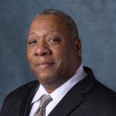 Headshot of APWU National Business Agent Kenneth Lester