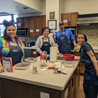 India, Tina, Kenny and Jasmine in the kitchen